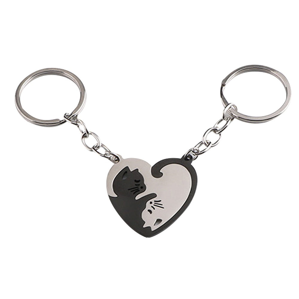 Pair of Heart Shaped Puzzle Cat Matching Keychains Black and Silver