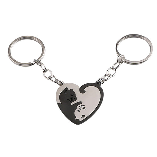 Pair of Heart Shaped Puzzle Cat Matching Keychains Black and Silver