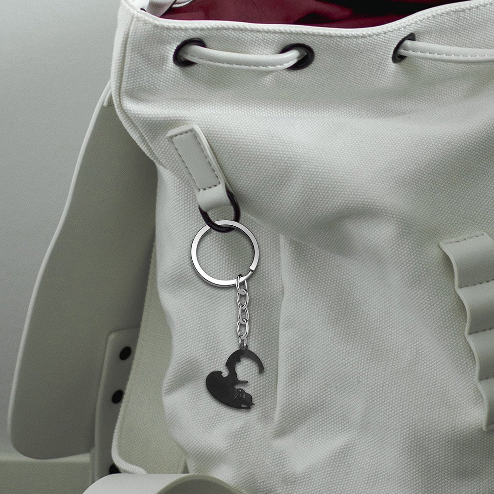 Pair of Heart Shaped Puzzle Cat Matching Keychains Black and Silver