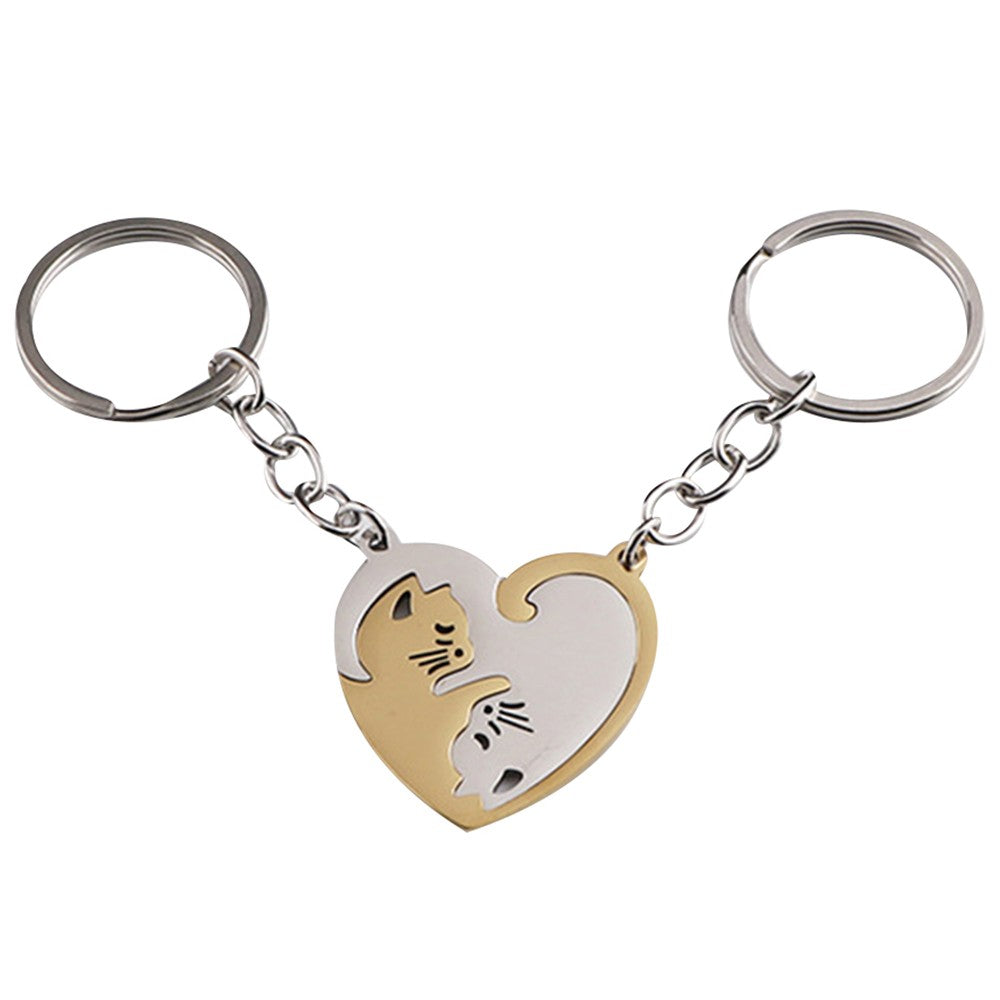 Pair of Heart Shaped Puzzle Cat Matching Keychains Gold and Silver